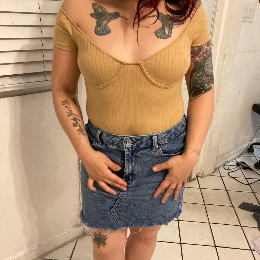 Tan body suit